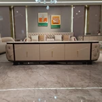 Cream Tufted Leather TV Stand with Oval Marble Top and Dark Glossy Frame